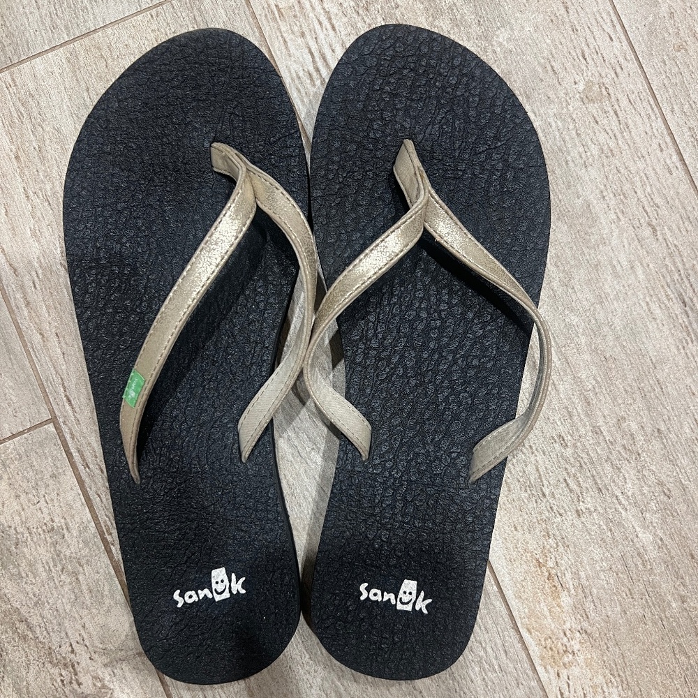 Sanuk Black and Gold Flip Flops